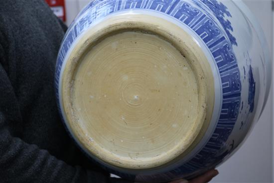 Two Chinese blue and white fish bowls on stands